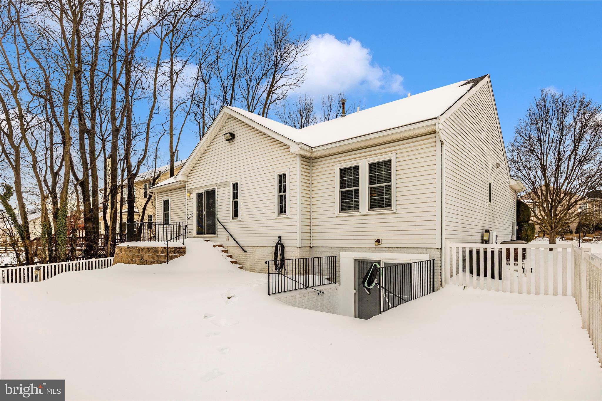 828 Geronimo Drive Frederick, MD 21701 - Photo 54 of 64 a view of a house with a snow in the yard