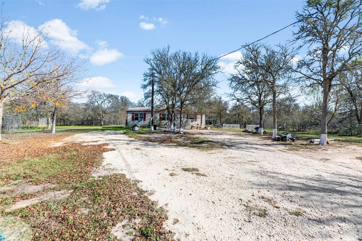 214 The Ranch Road Del Valle, TX 78617 - Photo 27 of 40 a view of road with snow