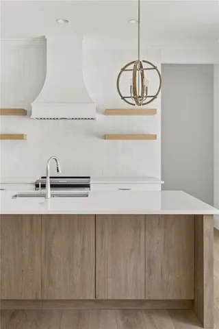 a view of kitchen and windows