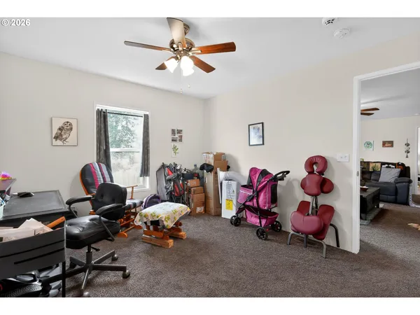 a living room with lots of furniture