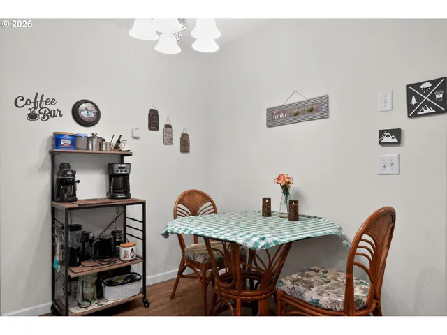 a view of a dining room with furniture