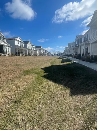 a view of swimming pool outdoor seating and city view