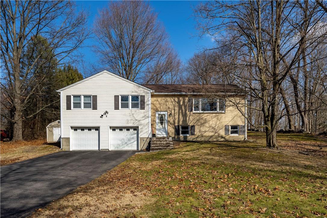 35 Montfort Road Wappingers Falls, NY 12590 - Photo 1 of 1 a front view of a house with a yard covered with snow in front of house