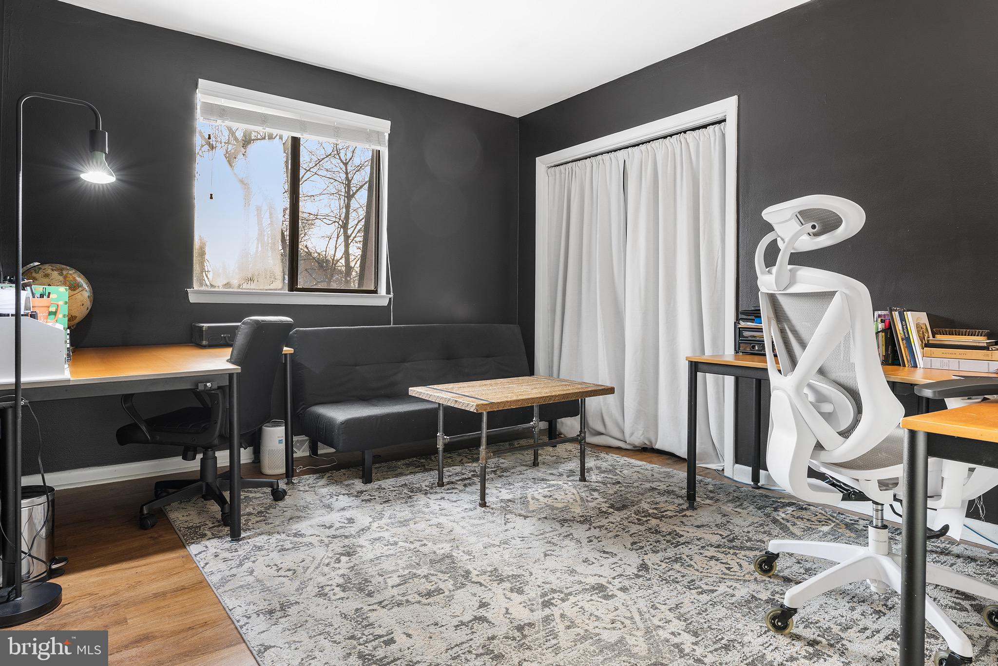 1237 Greeley Avenue Warminster, PA 18974 - Photo 38 of 107 a living room with furniture a rug and a window