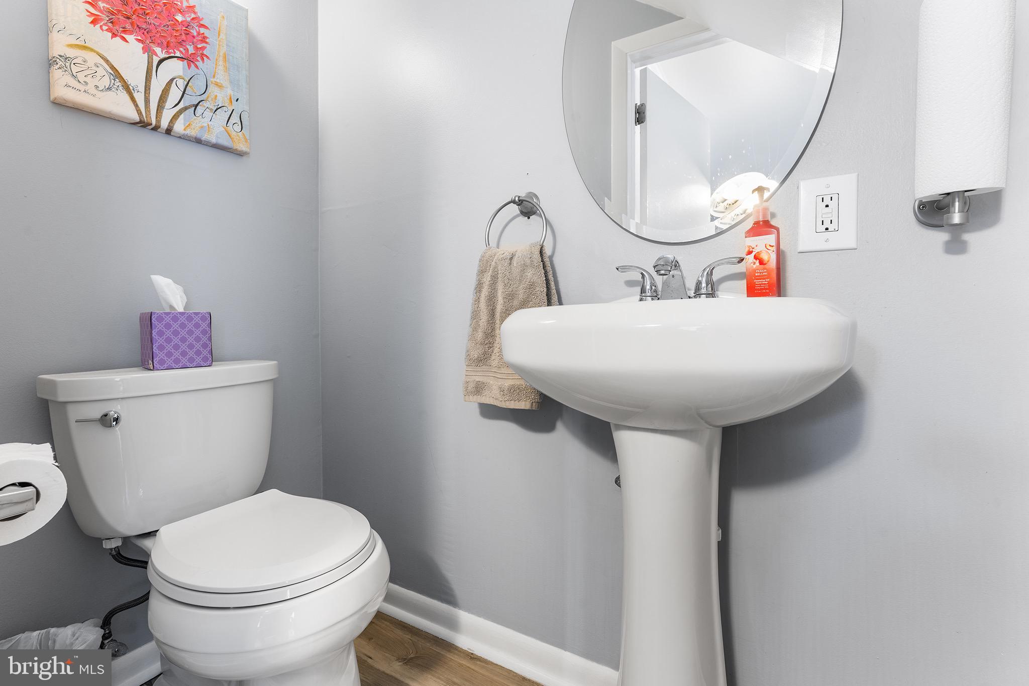 1237 Greeley Avenue Warminster, PA 18974 - Photo 5 of 107 a bathroom with a sink mirror and toilet