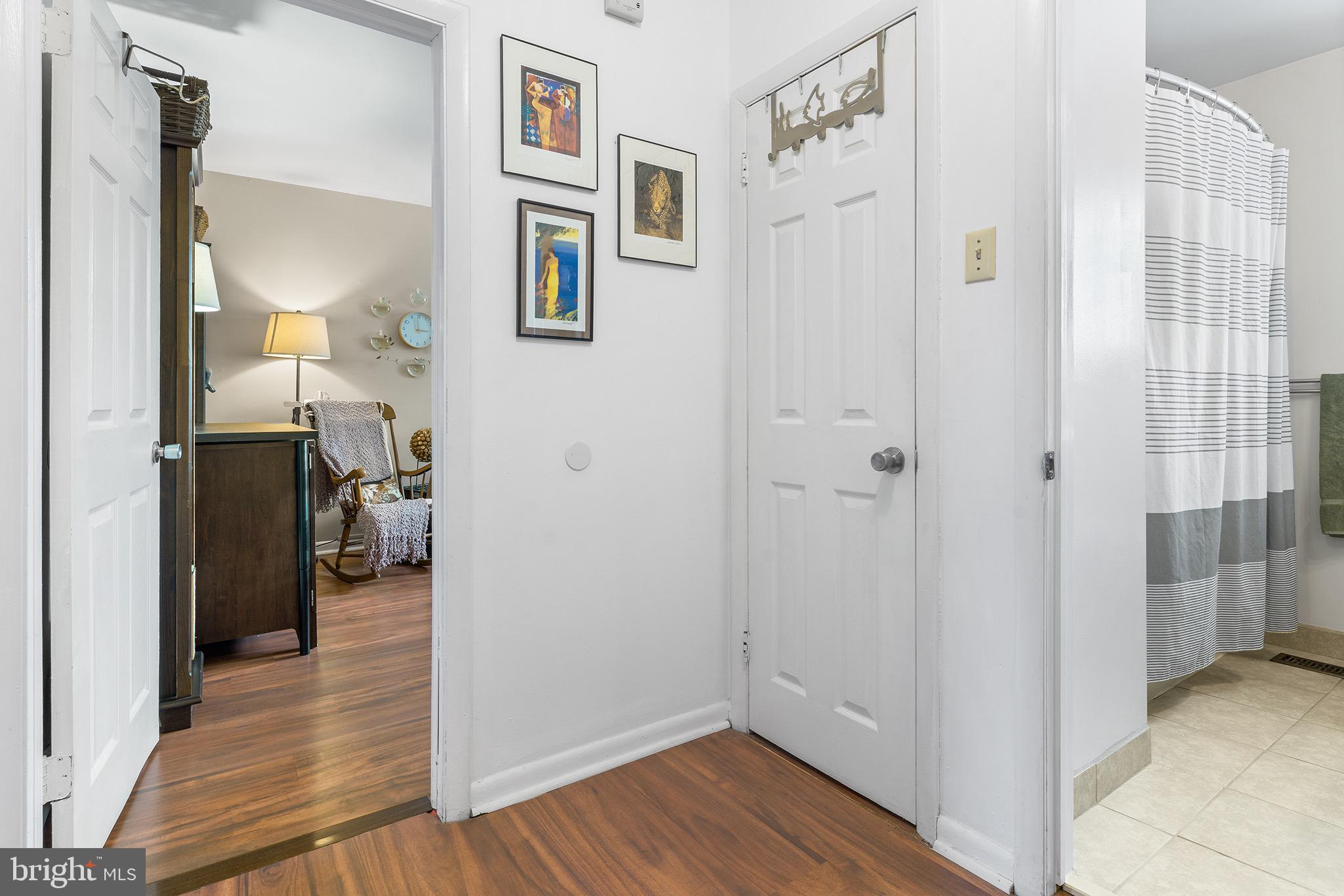 1237 Greeley Avenue Warminster, PA 18974 - Photo 56 of 107 a view of a hallway with wooden floor and closet