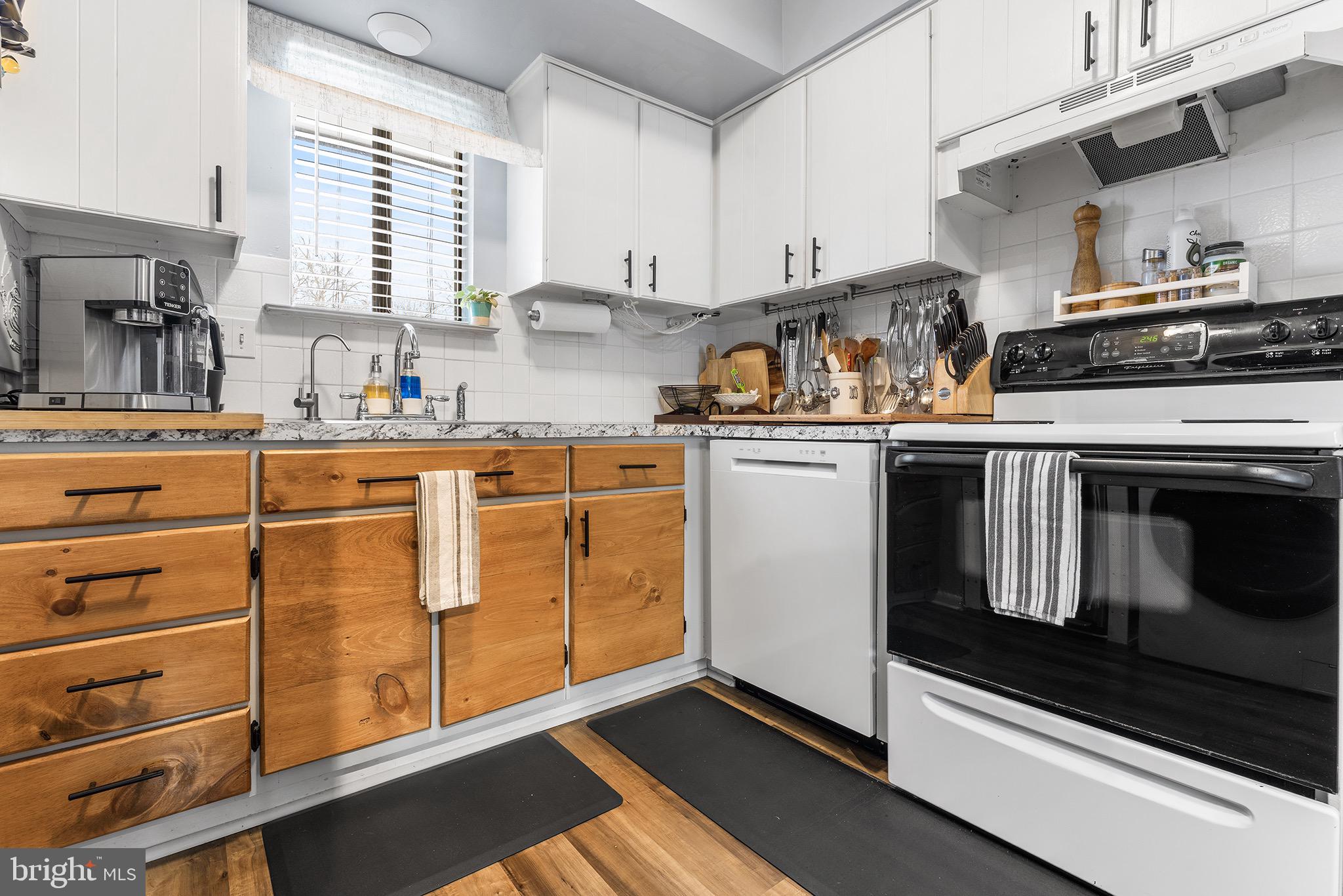 1237 Greeley Avenue Warminster, PA 18974 - Photo 57 of 107 a kitchen with stainless steel appliances granite countertop a stove and cabinets