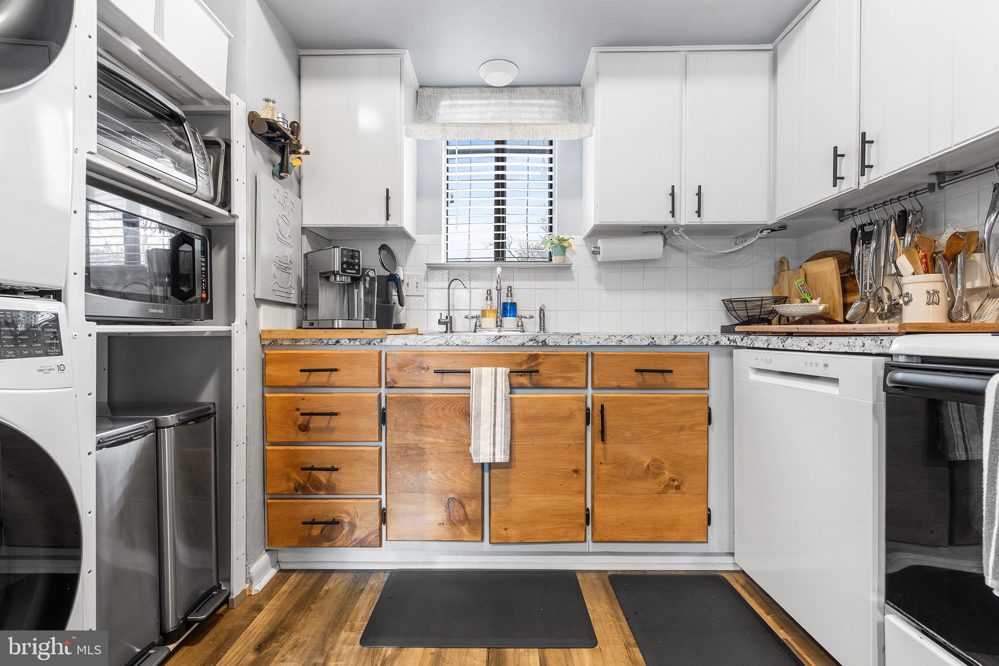 1237 Greeley Avenue Warminster, PA 18974 - Photo 74 of 107 a kitchen with stainless steel appliances granite countertop a refrigerator and a stove