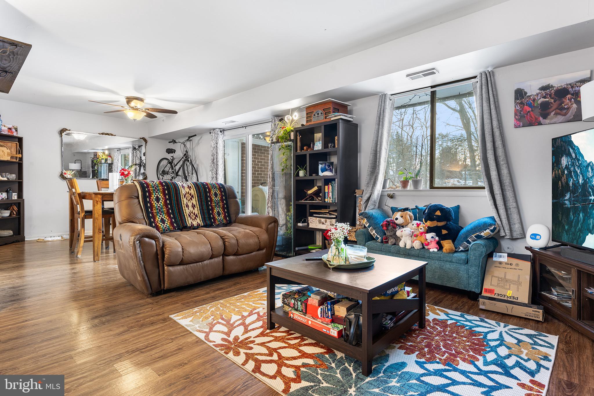 1237 Greeley Avenue Warminster, PA 18974 - Photo 80 of 107 a living room with furniture and a flat screen tv