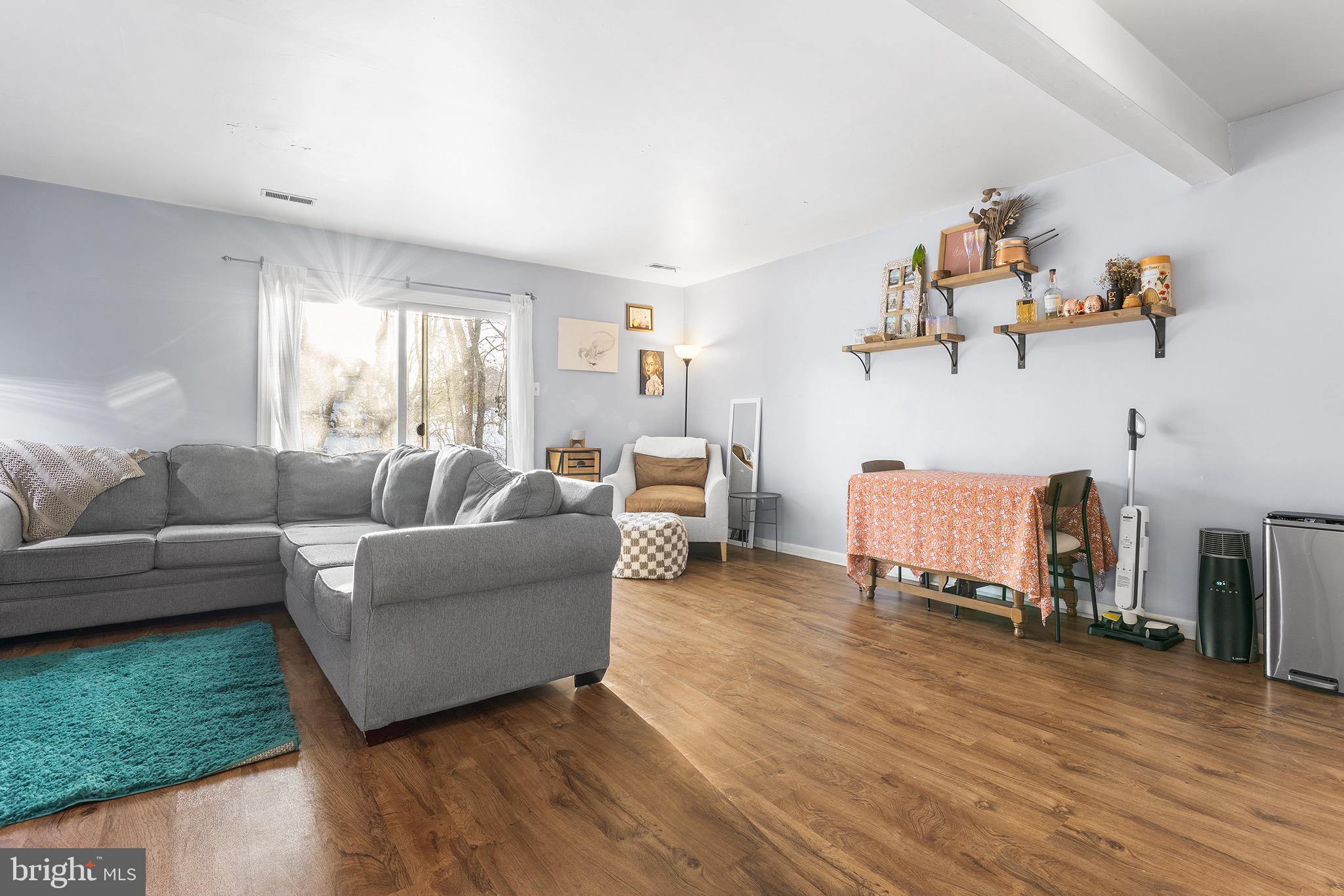 1237 Greeley Avenue Warminster, PA 18974 - Photo 88 of 107 a living room with furniture and a wooden floor