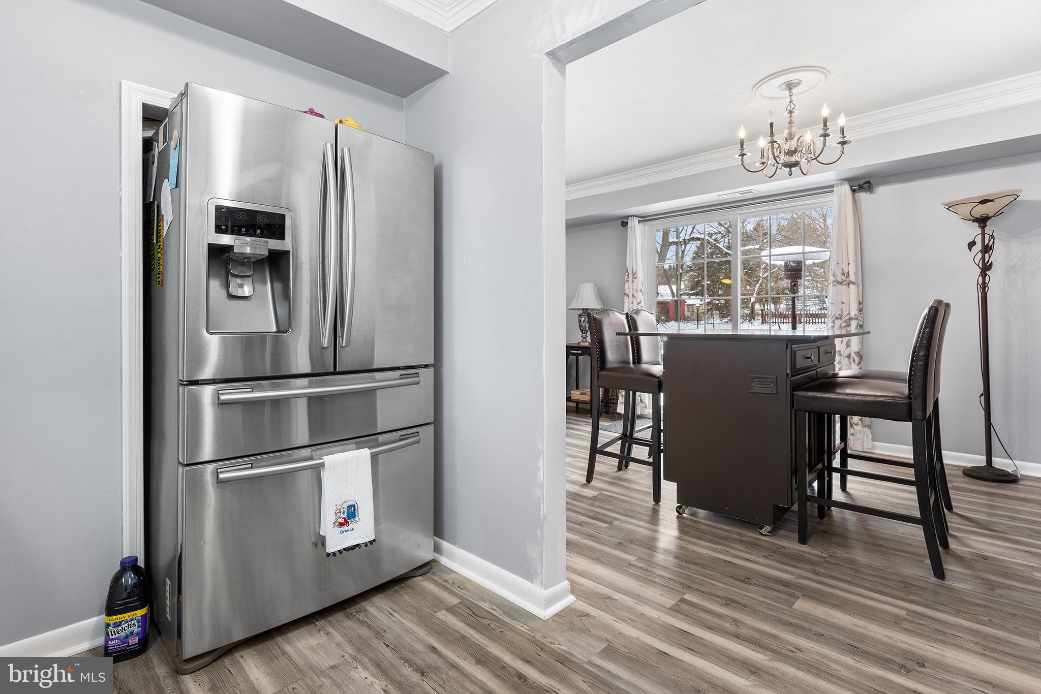 1237 Greeley Avenue Warminster, PA 18974 - Photo 9 of 107 a kitchen with stainless steel appliances granite countertop a refrigerator and microwave