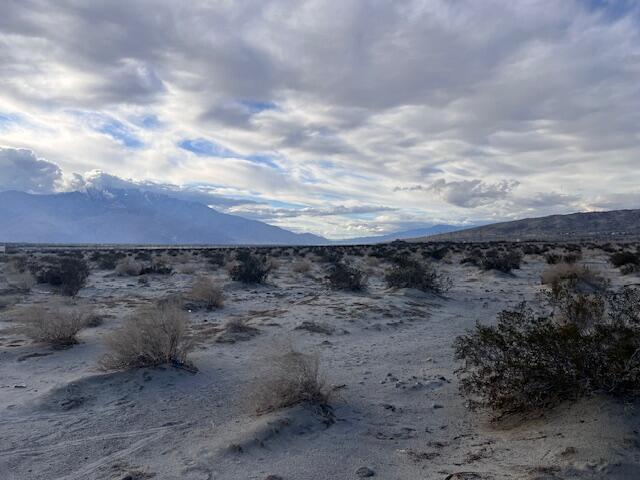 2-15 30th Avenue Thousand Palms, CA 92276 - Photo 5 of 7 a view of a dry yard with wooden fence