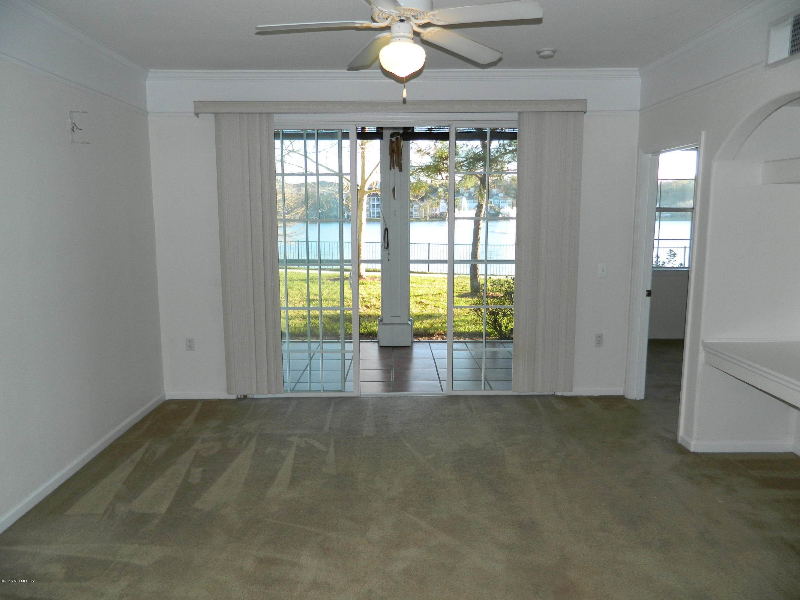 8550 Touchton Road, Unit 616 Jacksonville, FL 32216 - Photo 11 of 77 LIVING ROOM FROM KITCHEN - NOTICE LAKE