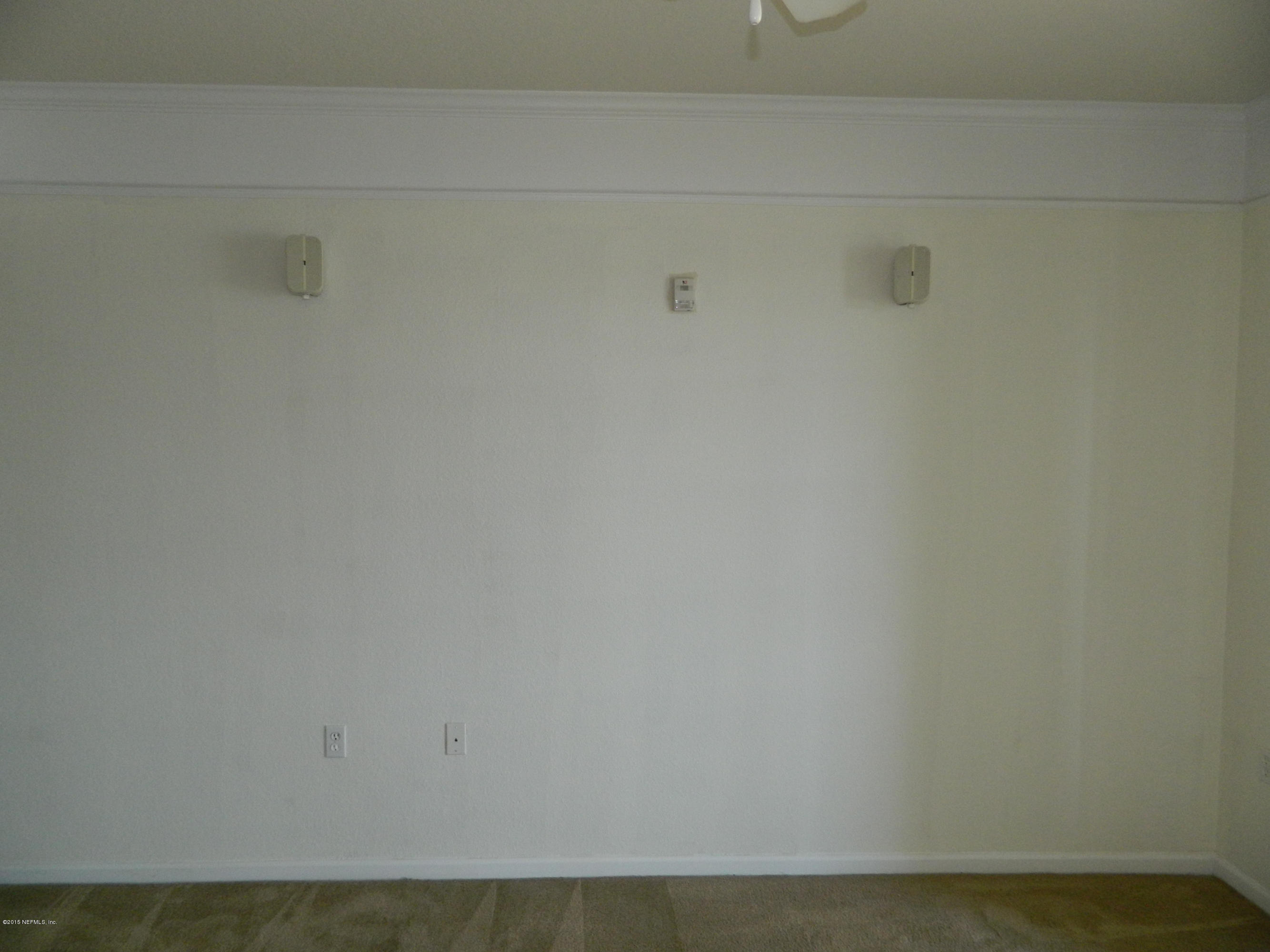 8550 Touchton Road, Unit 616 Jacksonville, FL 32216 - Photo 15 of 77 LIVING ROOM WITH WALL MOUNTED SPEAKERS