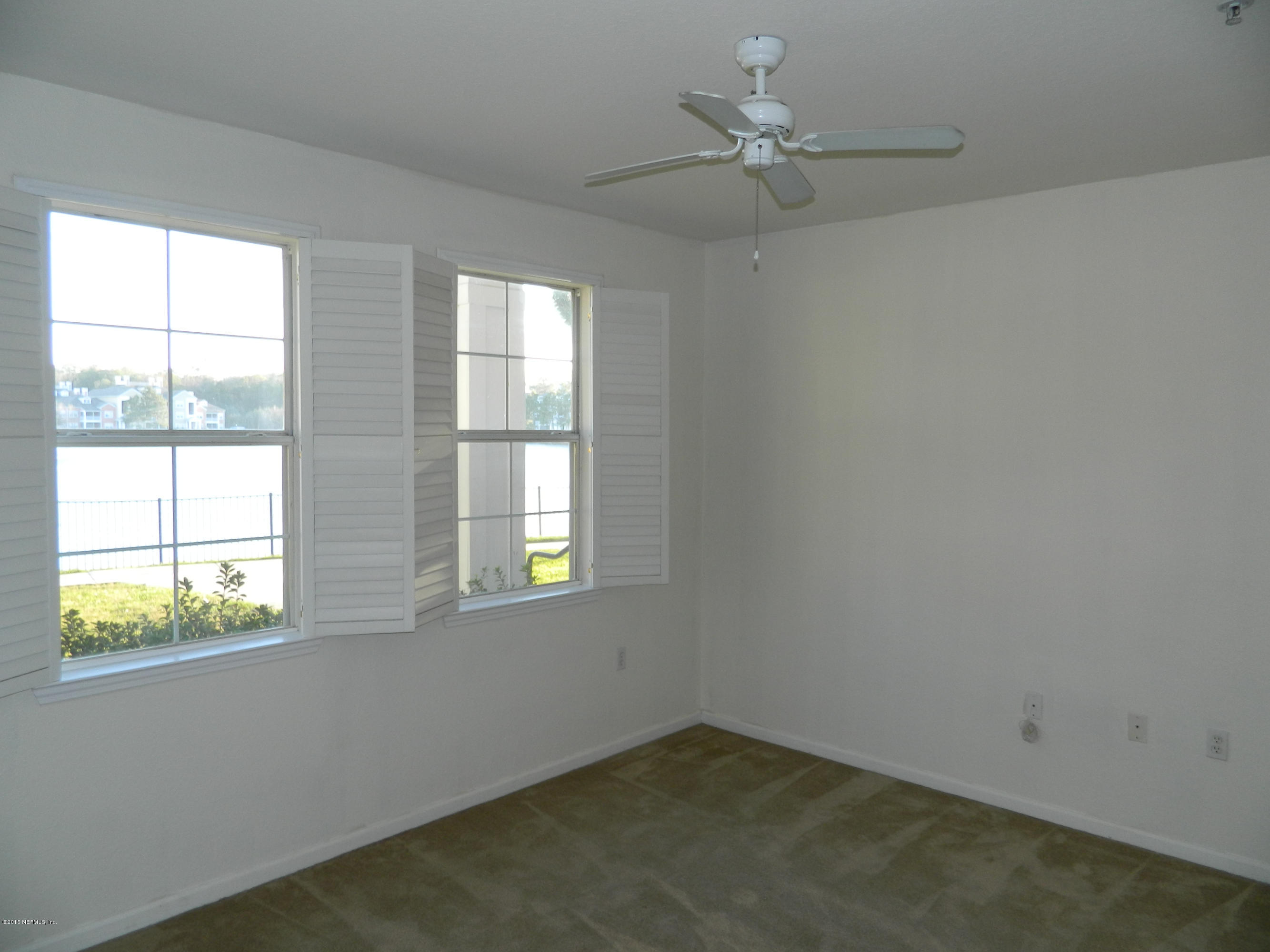 8550 Touchton Road, Unit 616 Jacksonville, FL 32216 - Photo 20 of 77 BEDROOM - BRIGHT W/ SHUTTERS OPEN