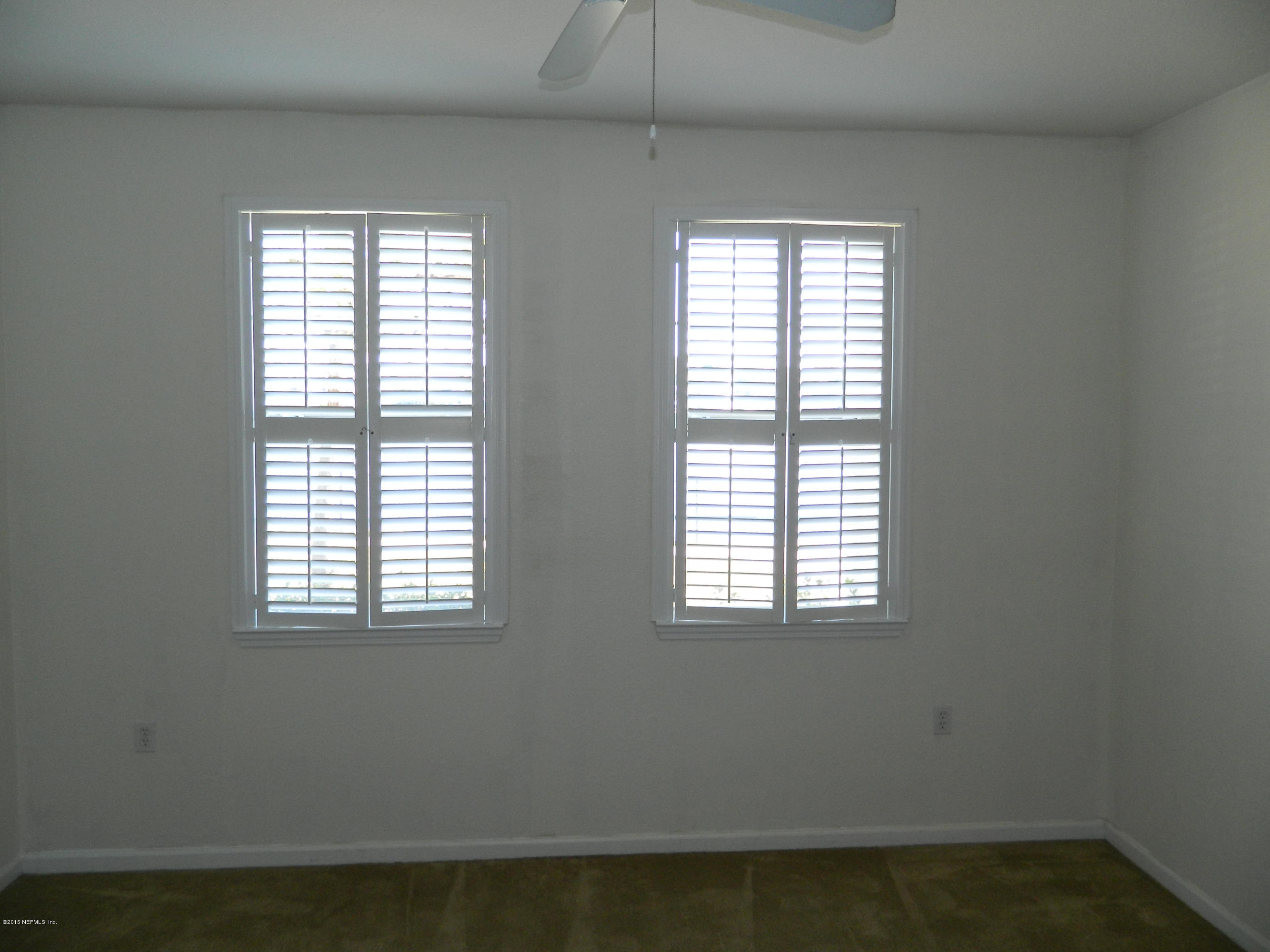 8550 Touchton Road, Unit 616 Jacksonville, FL 32216 - Photo 22 of 77 BEDROOM WITH PLANTATION SHUTTERS