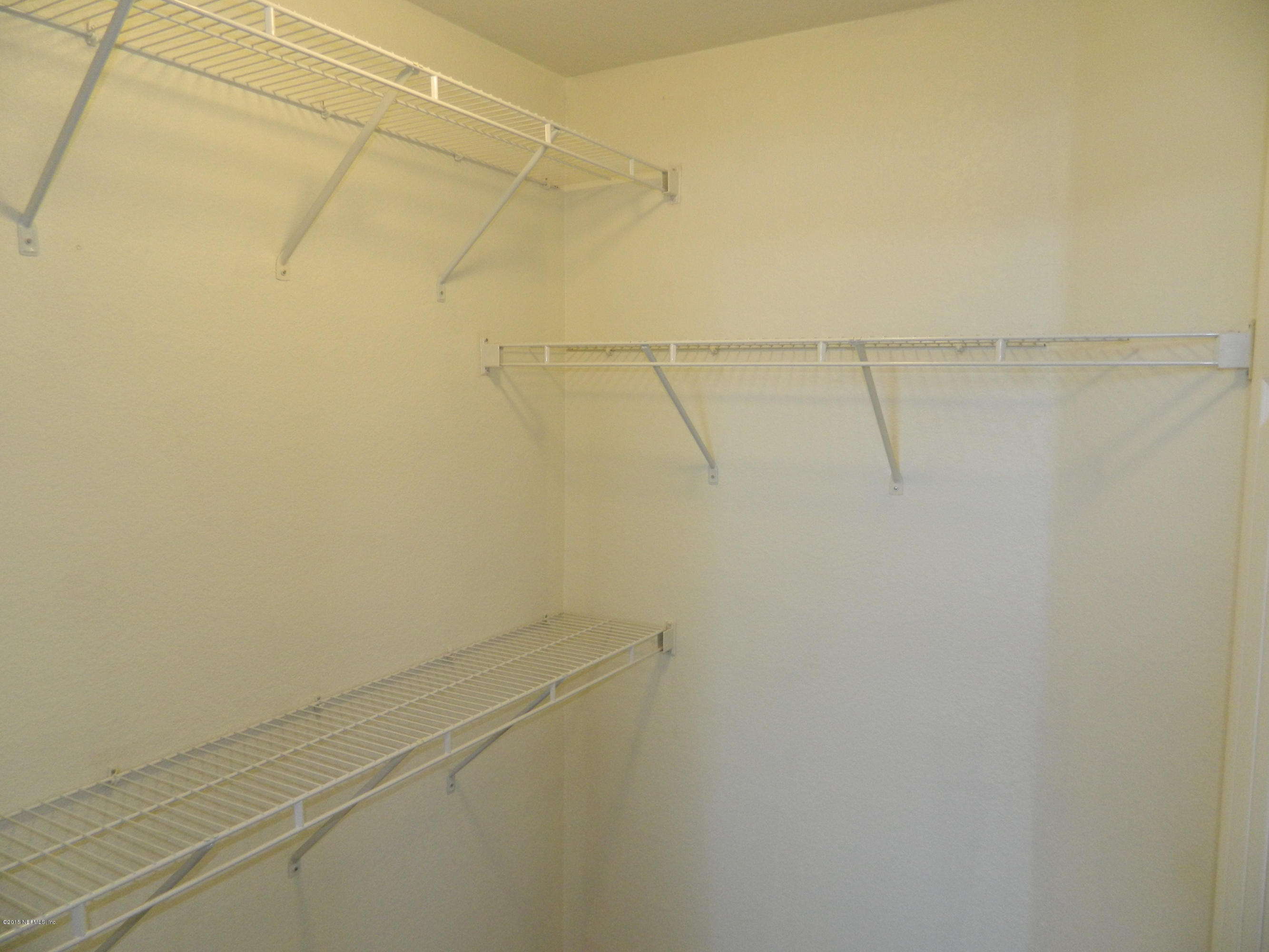 8550 Touchton Road, Unit 616 Jacksonville, FL 32216 - Photo 25 of 77 WALK-IN CLOSET WITH DOUBLE SHELVING