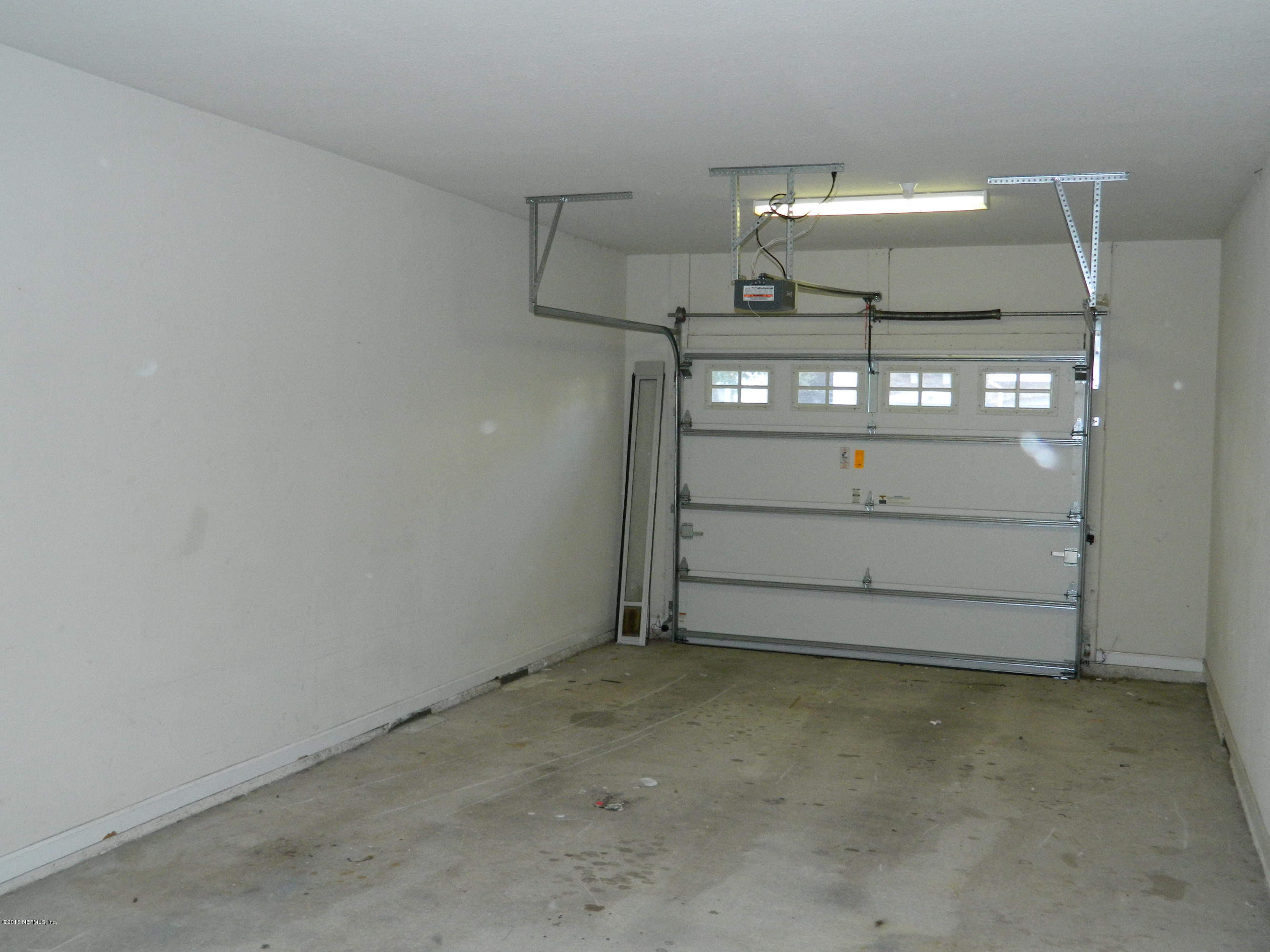 8550 Touchton Road, Unit 616 Jacksonville, FL 32216 - Photo 33 of 77 AUTOMATIC GARAGE DOOR