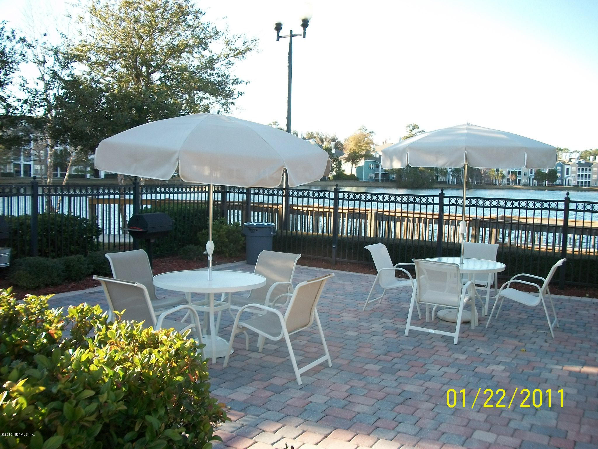 8550 Touchton Road, Unit 616 Jacksonville, FL 32216 - Photo 67 of 77 UMBRELLA TABLES AT SOUTH POOL