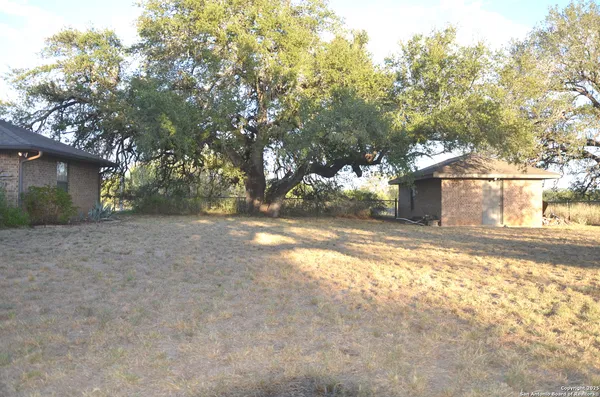 a view of back yard of the house