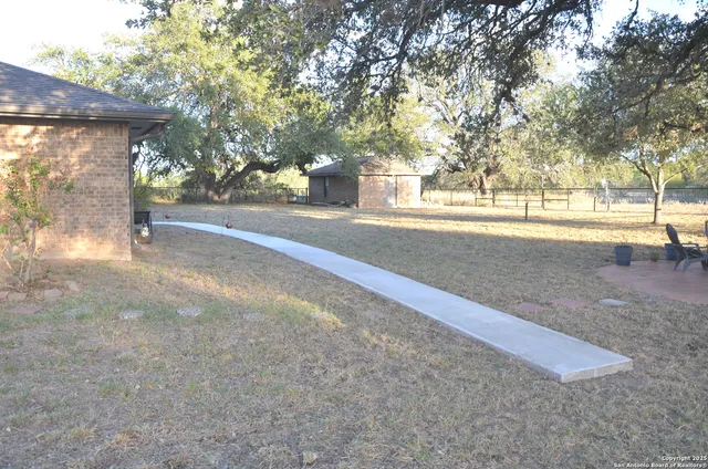 a view of road and trees