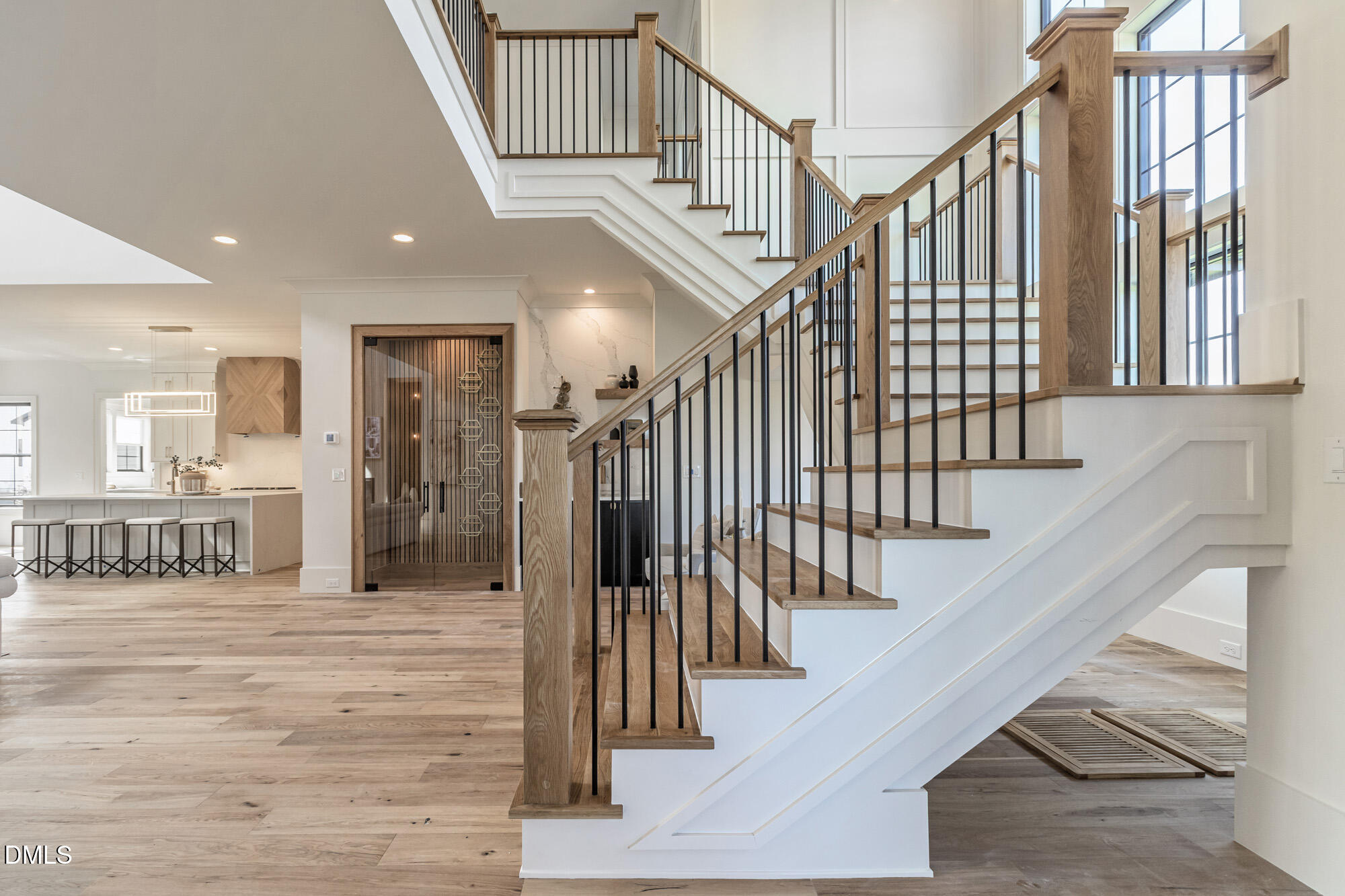 372 Firefly Overlook Pittsboro, NC 27312 - Photo 13 of 85 a view of staircase with lots of frames and frames on wall