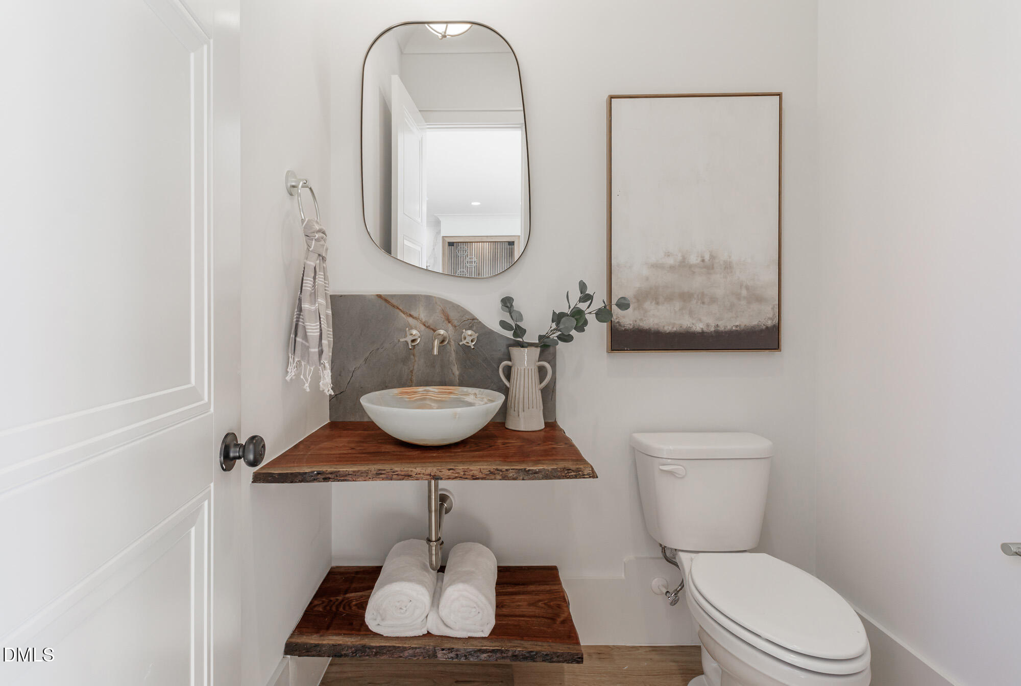 372 Firefly Overlook Pittsboro, NC 27312 - Photo 46 of 85 a bathroom with a toilet a sink and mirror
