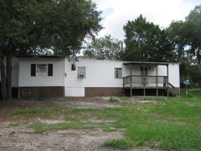 749 Georgetown Denver Road Crescent City, FL 32112 - Photo 2 of 13 HOUSE BACK VIEW & PORCH IMG_0014