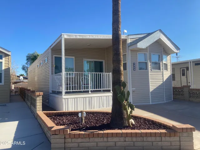 a front view of a house with garage