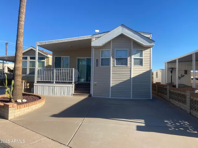 a front view of a house with garage