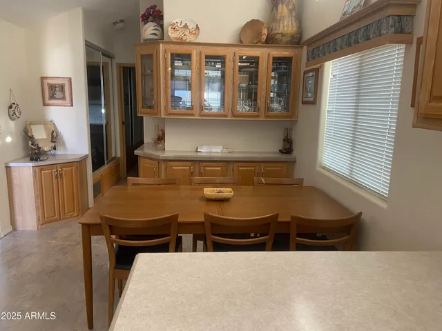 a living room with chairs