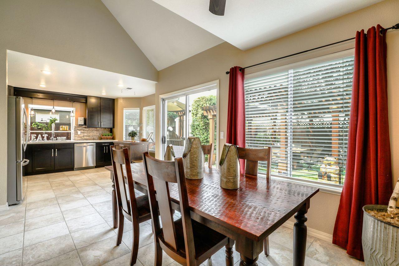 1645 Klipspringer Drive San Jose, CA 95124 - Photo 13 of 47 a view of a dining room with furniture and window