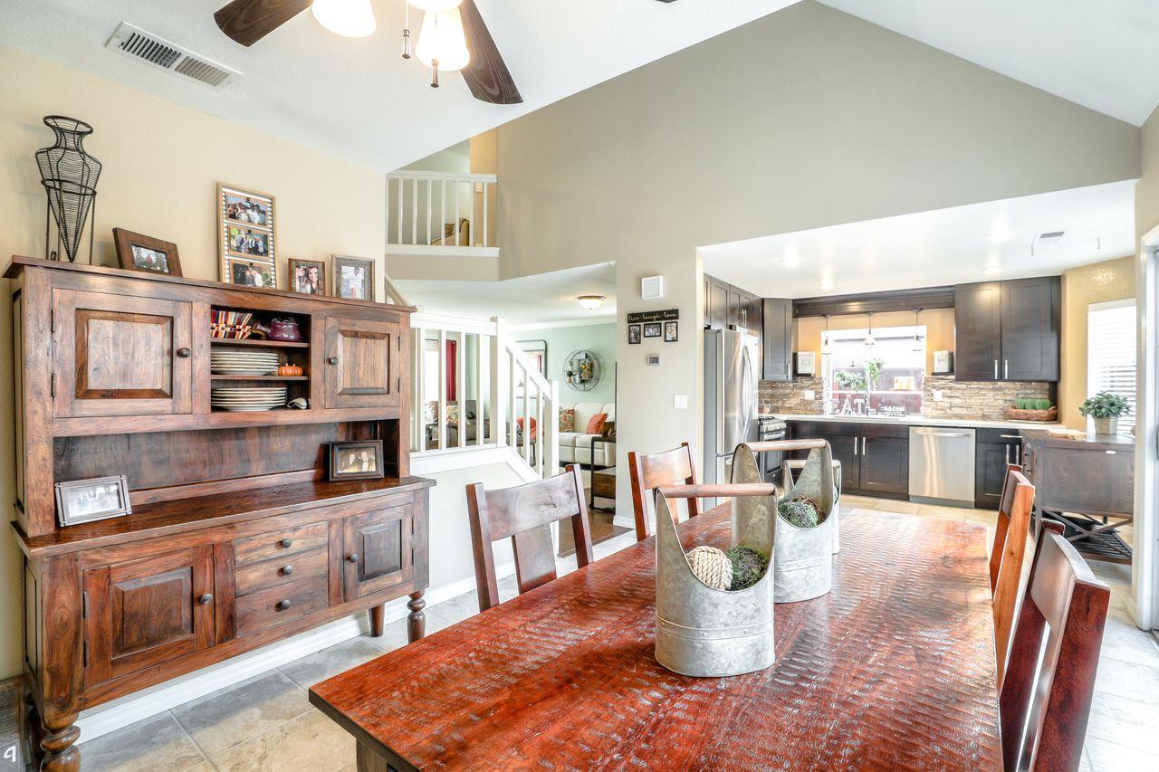 1645 Klipspringer Drive San Jose, CA 95124 - Photo 15 of 47 a dining room with furniture and a kitchen view
