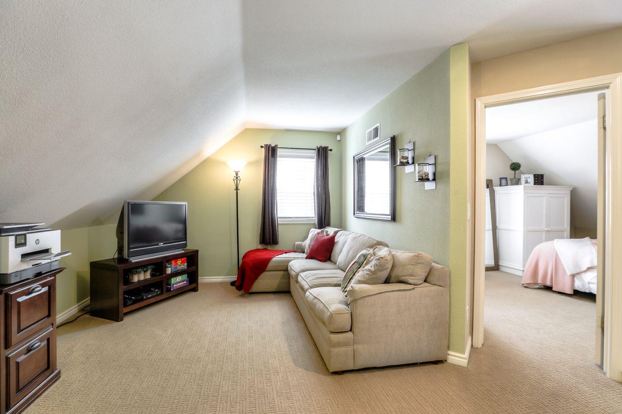 1645 Klipspringer Drive San Jose, CA 95124 - Photo 20 of 47 a living room with furniture and a flat screen tv