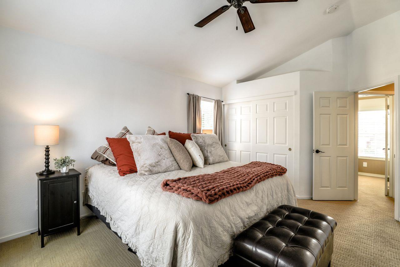 1645 Klipspringer Drive San Jose, CA 95124 - Photo 22 of 47 a bedroom with a bed and walk in closet