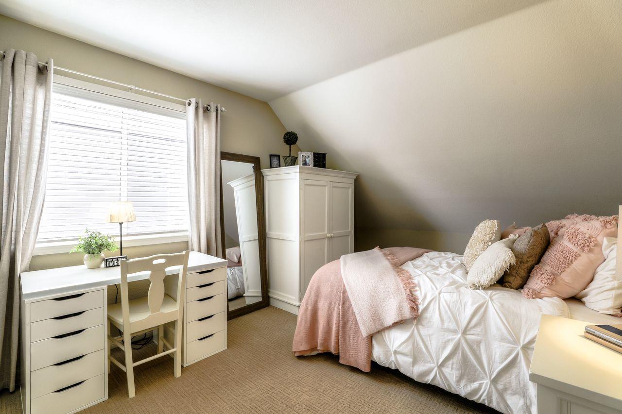 1645 Klipspringer Drive San Jose, CA 95124 - Photo 29 of 47 a bedroom with a bed and a window