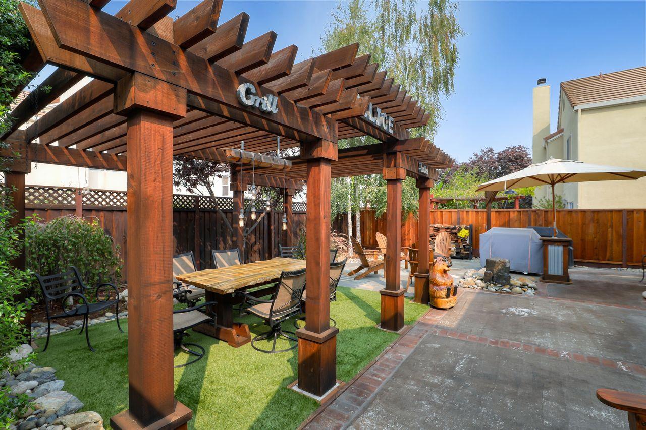 1645 Klipspringer Drive San Jose, CA 95124 - Photo 36 of 47 a view of a chairs and table in patio with a barbeque