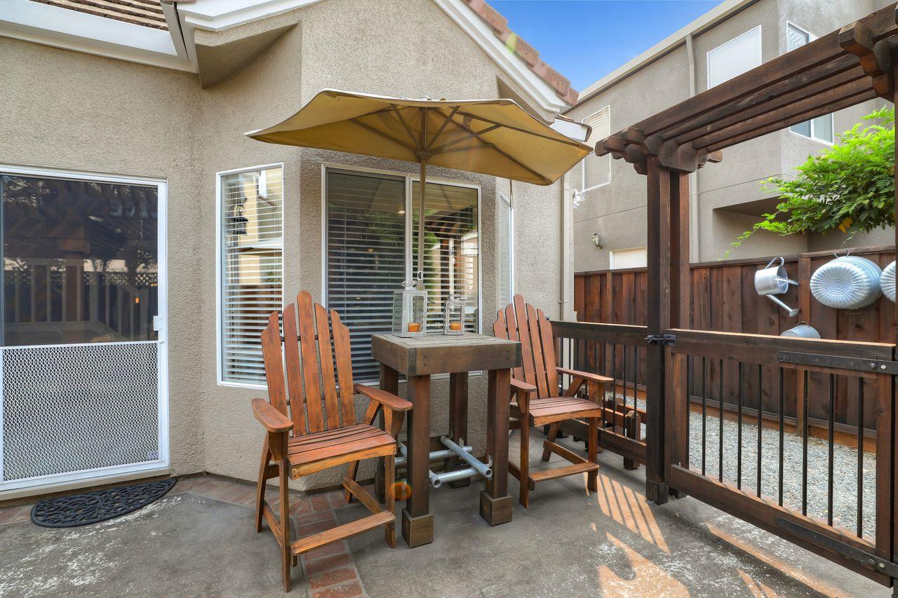 1645 Klipspringer Drive San Jose, CA 95124 - Photo 43 of 47 a view of a patio with a table and chairs