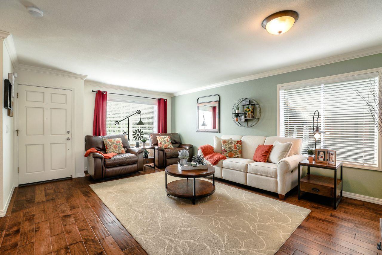 1645 Klipspringer Drive San Jose, CA 95124 - Photo 5 of 47 a living room with furniture and a rug