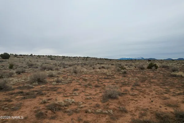 a view of ocean and mountain