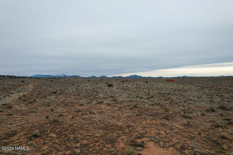 608 East Foothill Drive Williams, AZ 86046 - Photo 5 of 7 a view of a large building with mountains in the background
