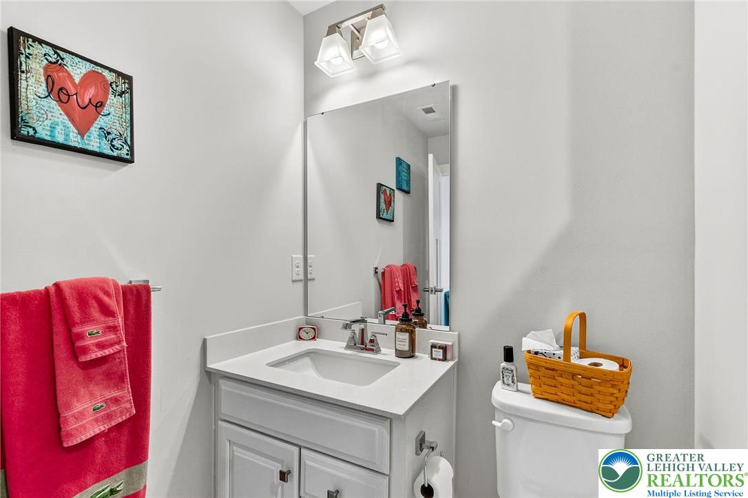 1606 Watson Loop Fogelsville, PA 18051 - Photo 24 of 76 a bathroom with a sink and a mirror