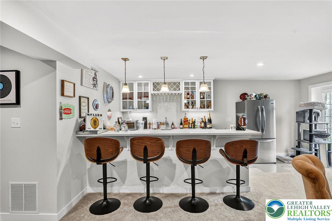 1606 Watson Loop Fogelsville, PA 18051 - Photo 57 of 76 a kitchen with lots of counter space furniture and appliances