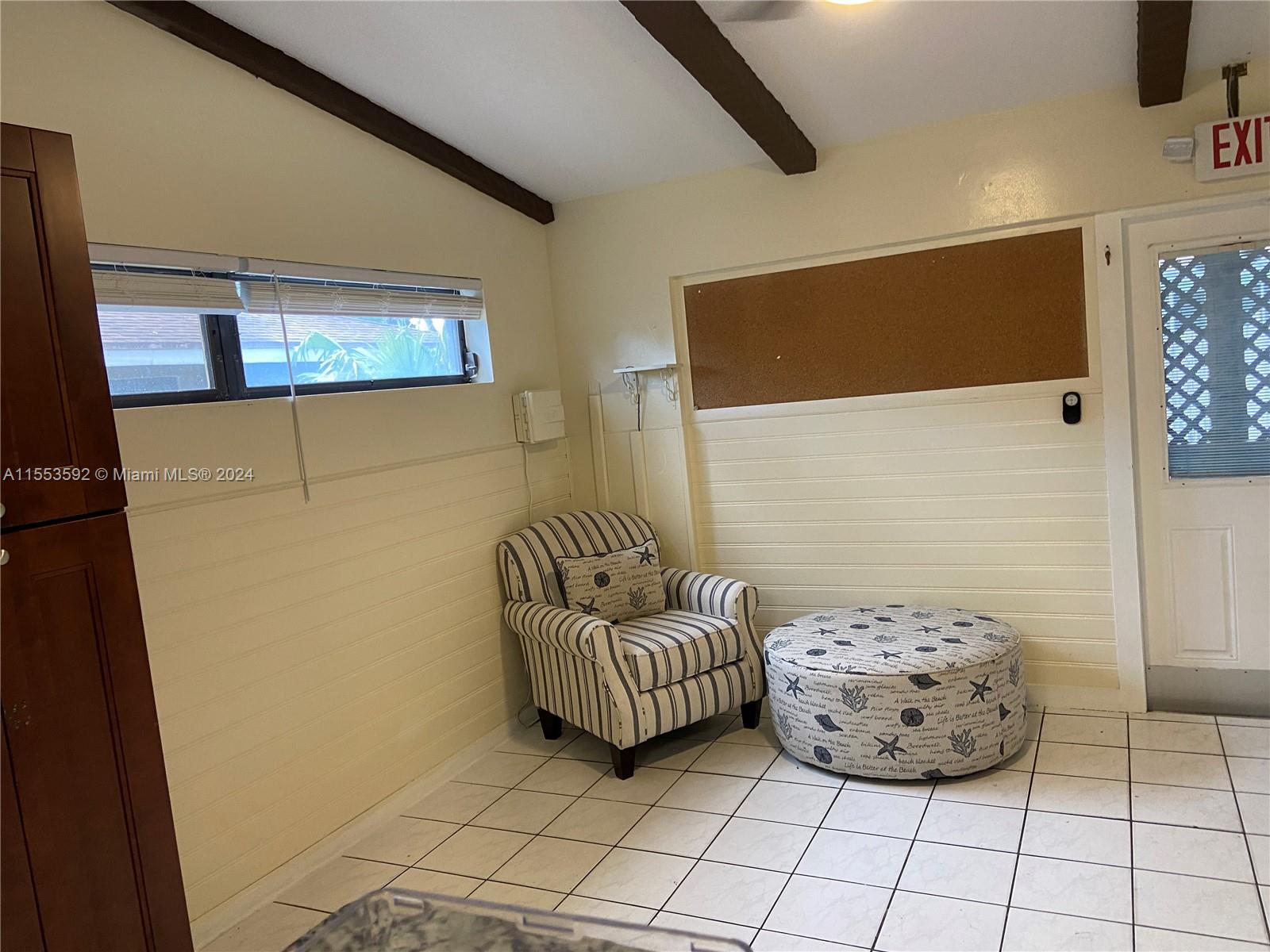 2897 Northeast 2nd Avenue Boca Raton, FL 33431 - Photo 7 of 20 a view of a couch in kitchen