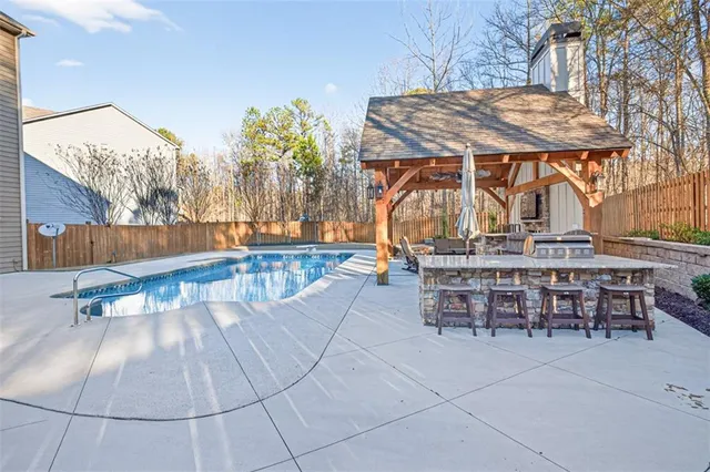 a picture of a table and chairs in the patio
