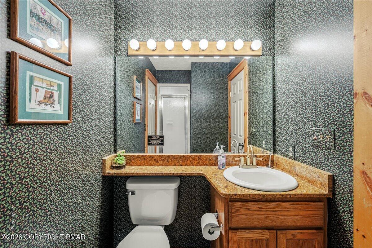 723 Lower Deer Valley Road Tannersville, PA 18372 - Photo 20 of 58 a bathroom with a sink and a mirror