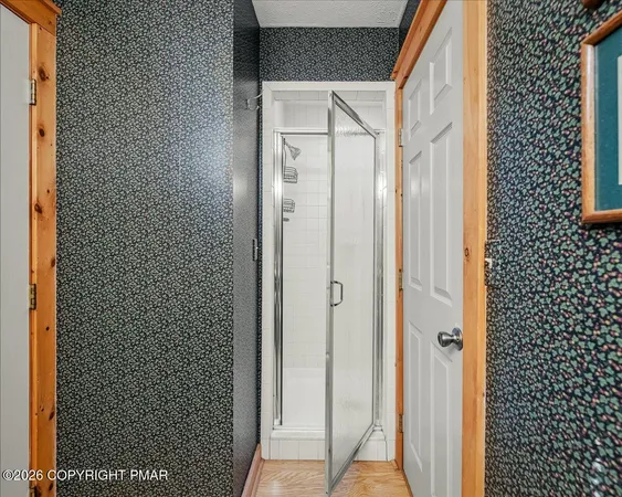a view of entryway with washer and dryer