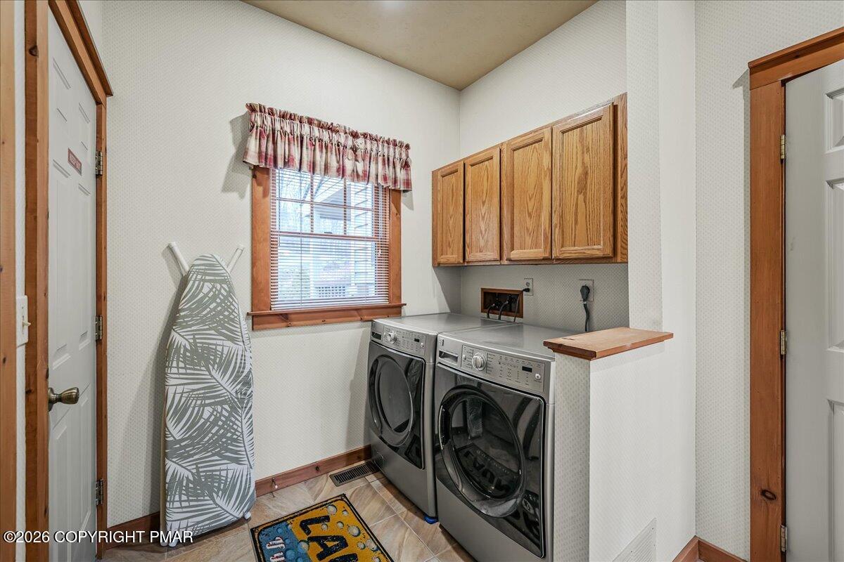 723 Lower Deer Valley Road Tannersville, PA 18372 - Photo 22 of 58 a view of entryway with washer and dryer