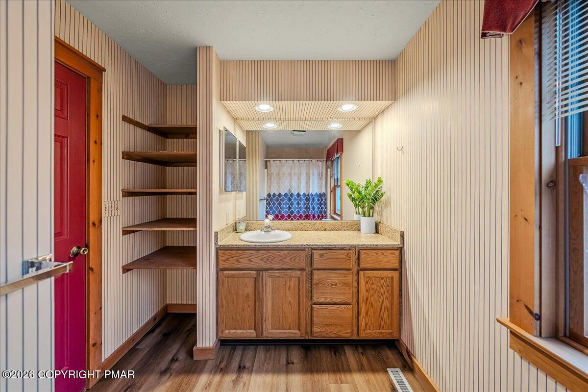 723 Lower Deer Valley Road Tannersville, PA 18372 - Photo 26 of 58 a bathroom with a sink and a mirror