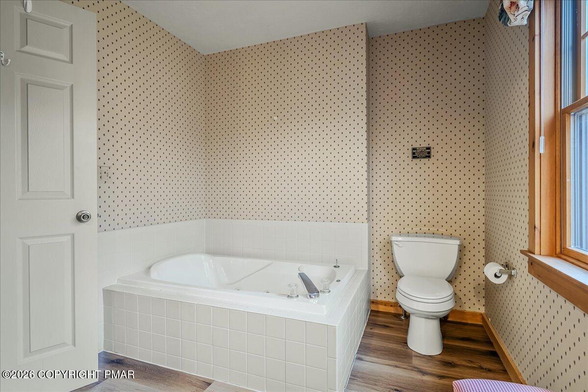 723 Lower Deer Valley Road Tannersville, PA 18372 - Photo 31 of 58 a bathroom with a toilet and a bathtub